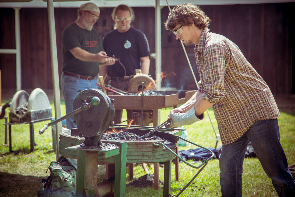 CBA_WesternStatesConference-4 A blacksmith practices in the workshop area after a demo.